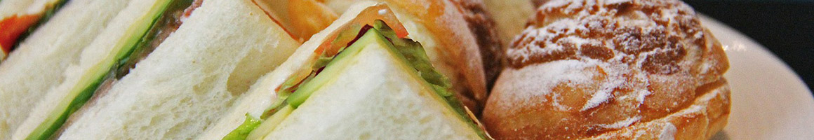 Eating Mediterranean Sandwich at Pita Grill restaurant in North Hollywood, CA.